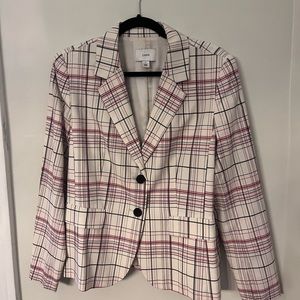 Lewit plaid wool blazer with cool pleat detail on back.